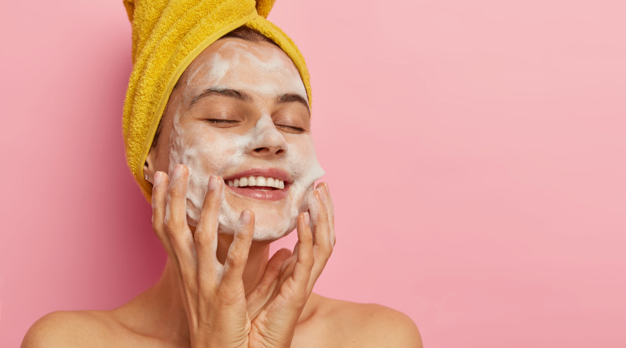 Woman using facial wash
