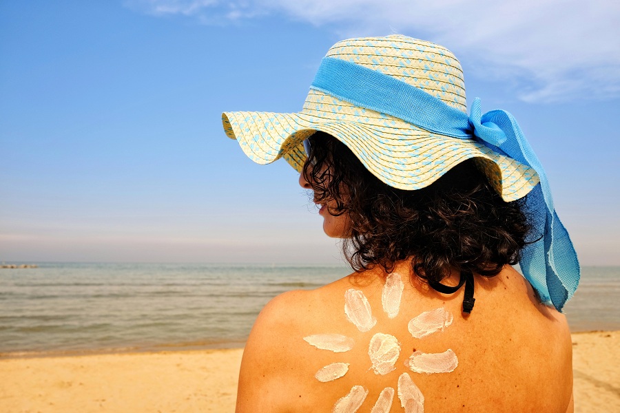 woman with sunscreen outdoors